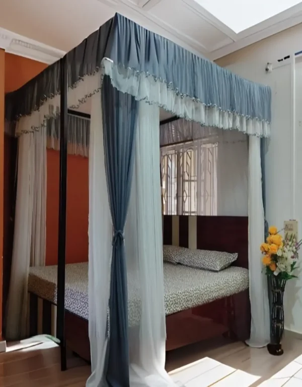 Gray and white curtain mosquito net in a bedroom