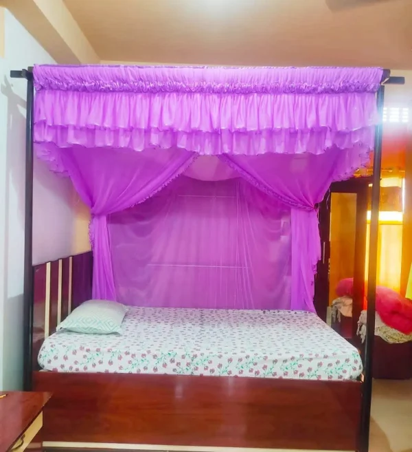 lavender mosquito net for bed in a bedroom