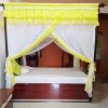 light yellow mosquito net for bed in a bedroom