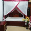 maroon striped mosquito net for bed in a bedroom
