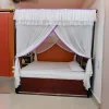 cream off white mosquito net for bed in a bedroom