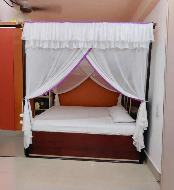 cream off white mosquito net for bed in a bedroom